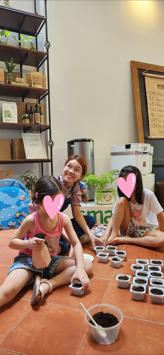 Anne running an ECO Vietnam Easter crafting workshop with children