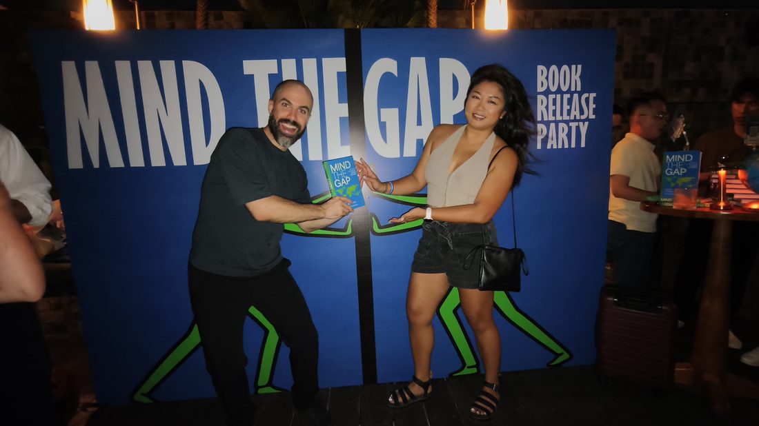 Guests celebrating the Mind The Gap book launch