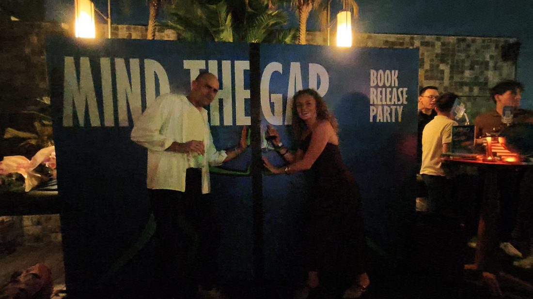 Guests toasting at the Mind The Gap launch