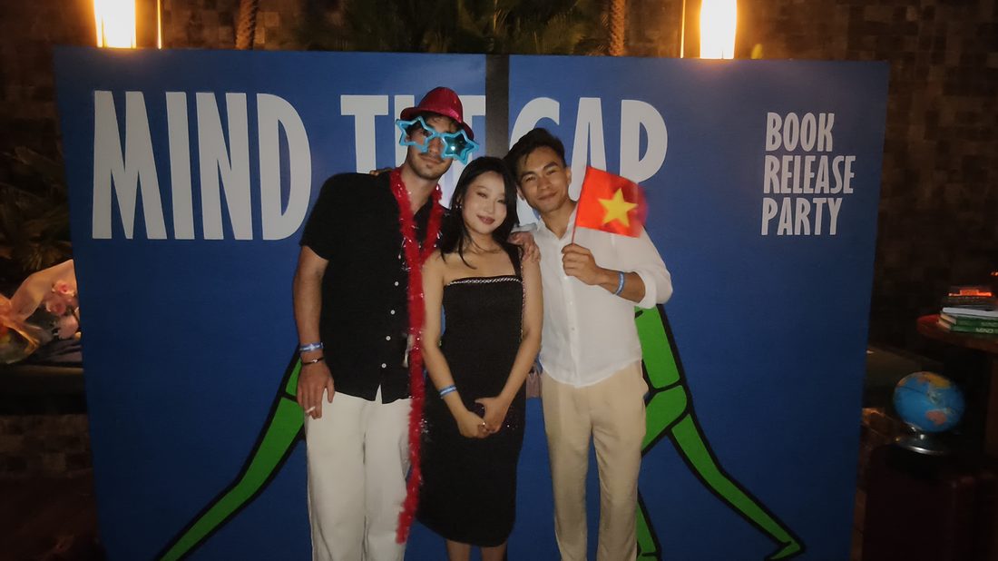 Guests celebrating the Mind The Gap book launch
